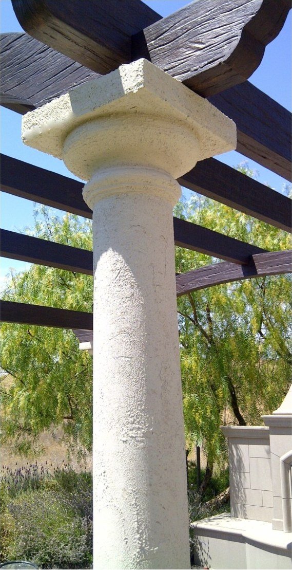 Original ESCO white plaster column under wooden pergola